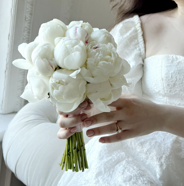 Bridal bouquet of white peonies