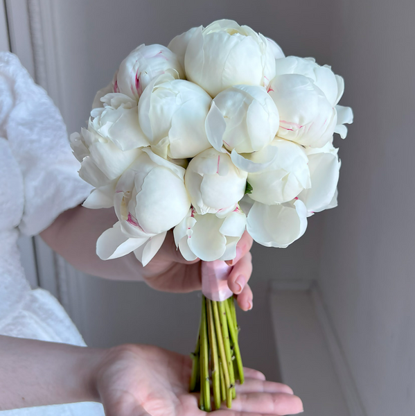 Bridal bouquet of white peonies